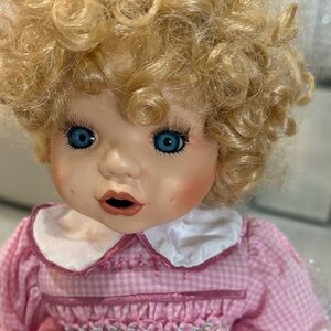 Curly Blonde Doll with Pink Dress